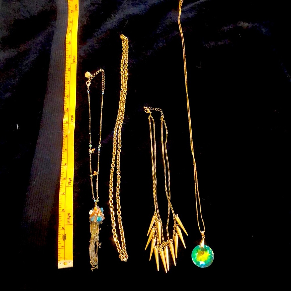 Four necklaces set. Beautiful I.  Great  variety to choose for every outfit!
